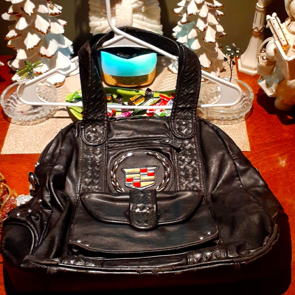 all leather black Cadillac backpack
